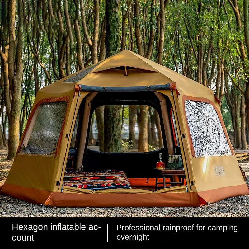 Tente gonflable hexagonale installée en pleine nature
