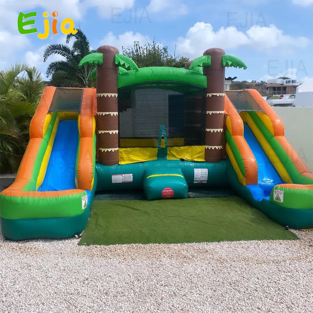 Aire de jeux gonflable tropicale avec double toboggan installée en extérieur