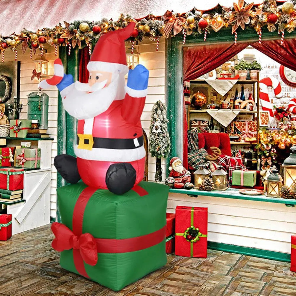 Décoration Noël gonflable Père Noël devant une maison