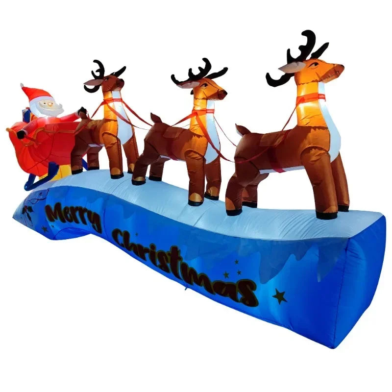 Décoration gonflable traîneau et cerf de Noël installée devant une maison