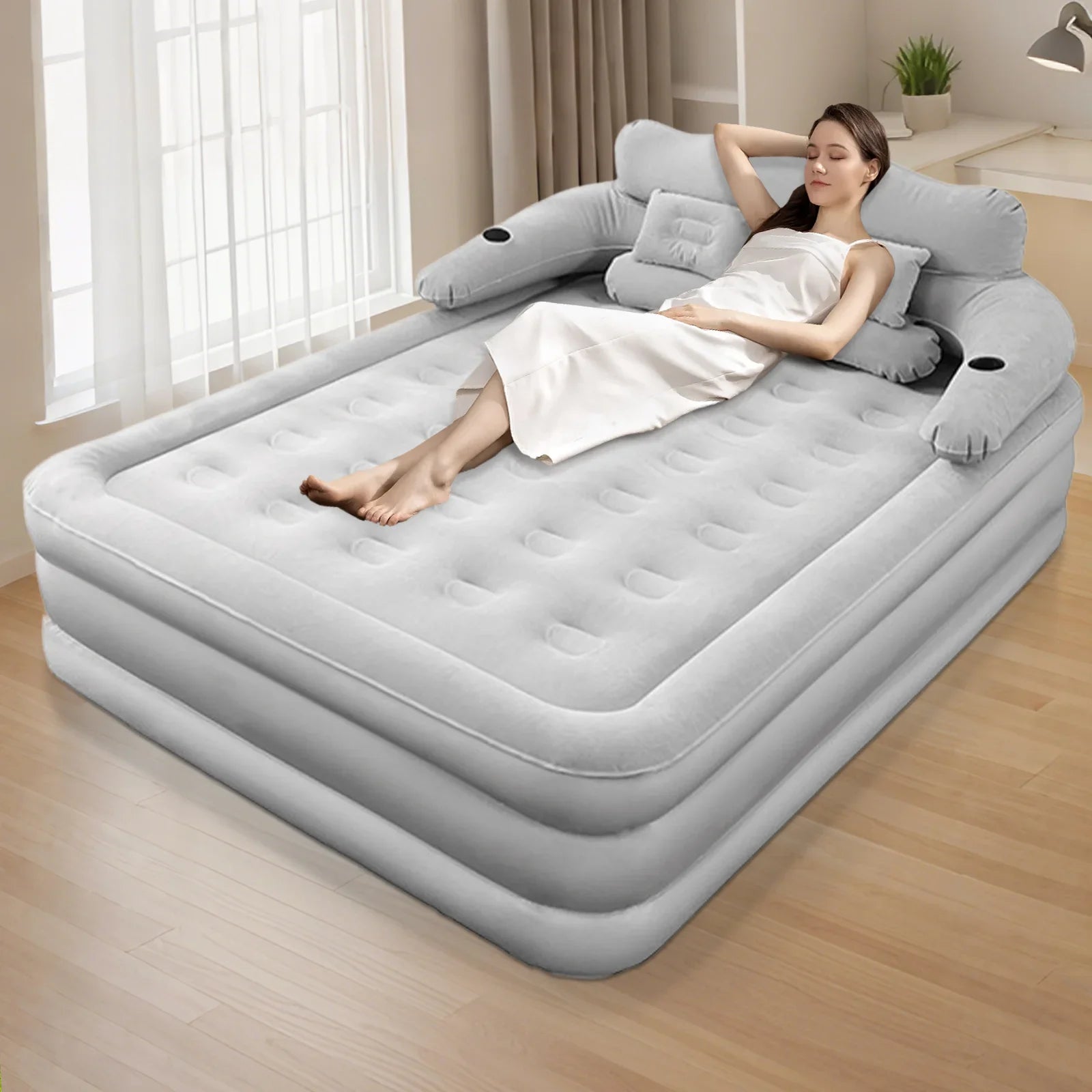 Matelas de camping gonflable 2 personnes installé sous une tente