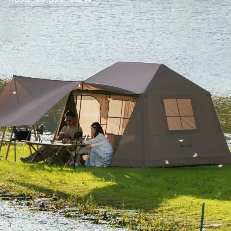 Tente gonflable parasol portative installée en camping