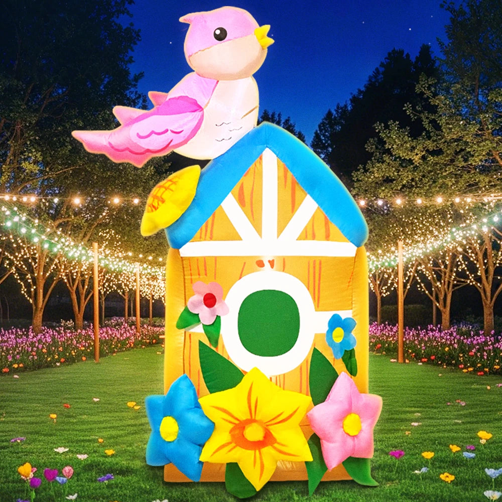Décoration gonflable maison d'oiseaux avec lumières LED dans un jardin