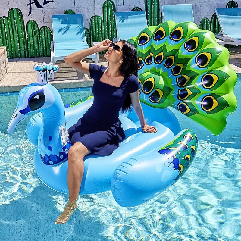 Bouée gonflable géante en forme de paon bleu avec ailes multicolores en piscine