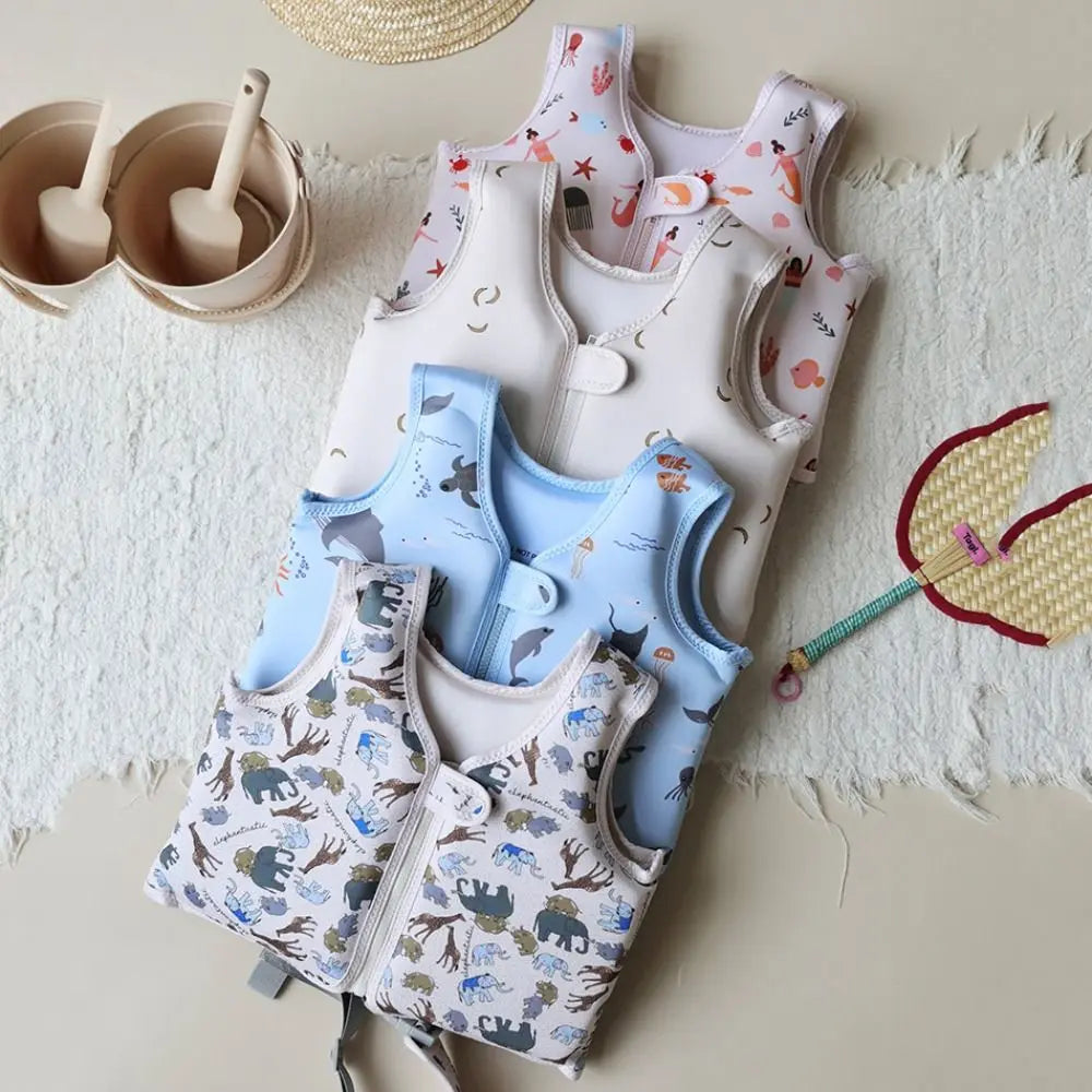 Gilet de flottaison porté par un enfant en piscine