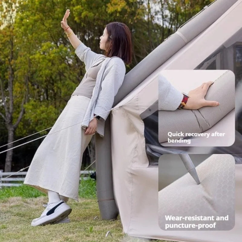 Tente gonflable kaki installée pour un camping en famille
