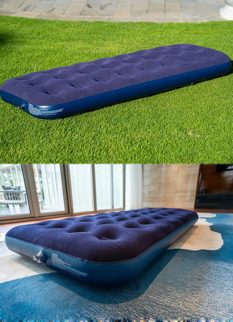 Tapis de couchage gonflable installé sous une tente de camping