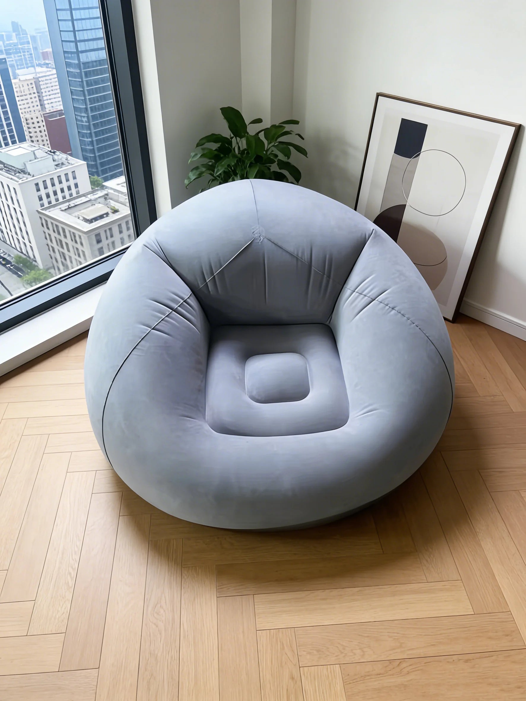 Canape gonflable rond gris vue de face