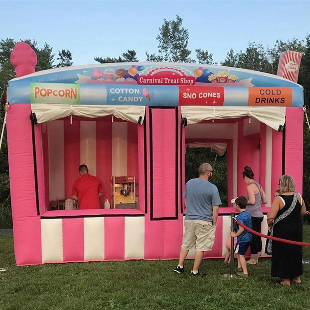 Stand gonflable rose installé lors d'un carnaval