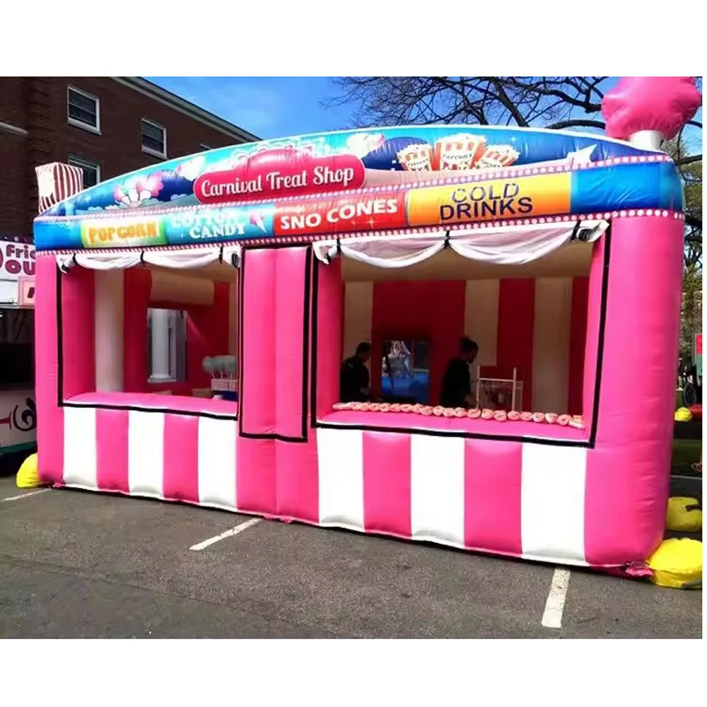 Stand gonflable rose installé lors d'un carnaval