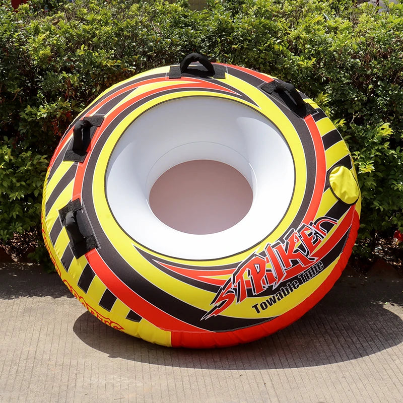 Bouée tractée gonflable ronde solo posée sur ponton