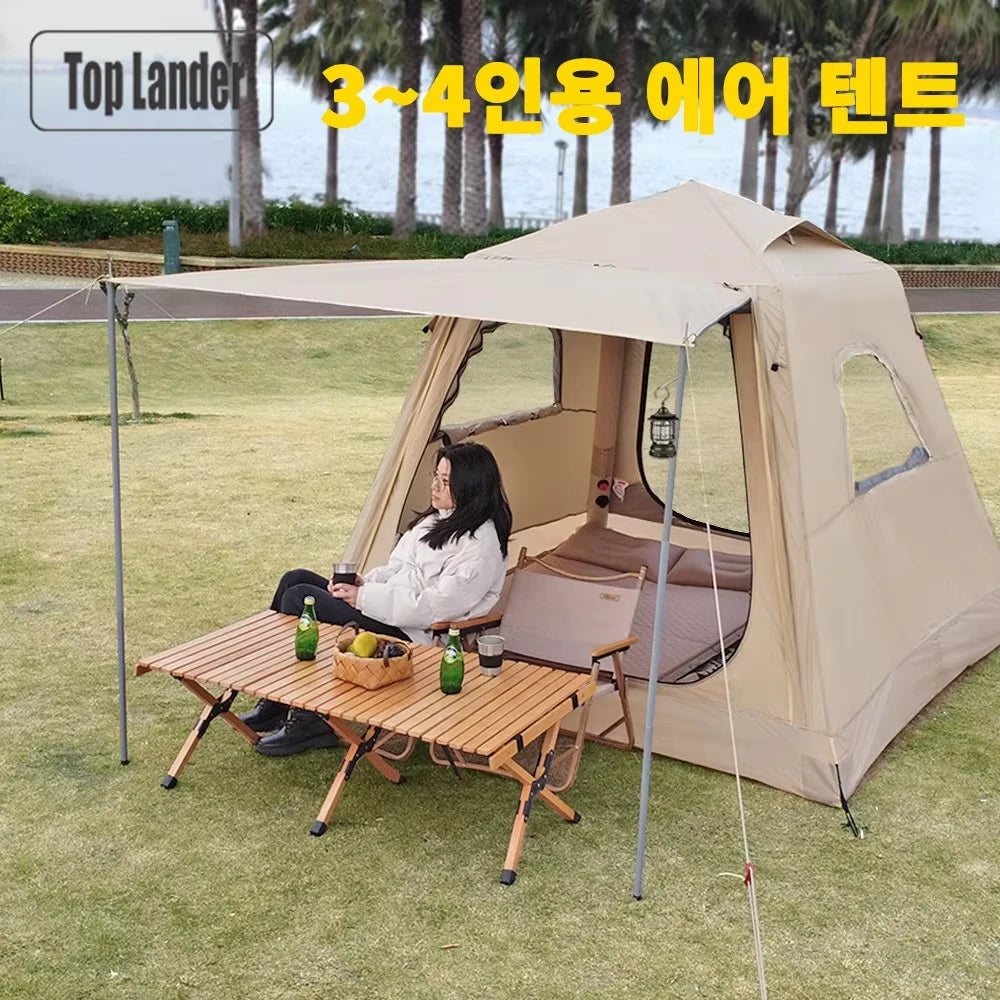 Tente gonflable air camping familiale installée en pleine nature