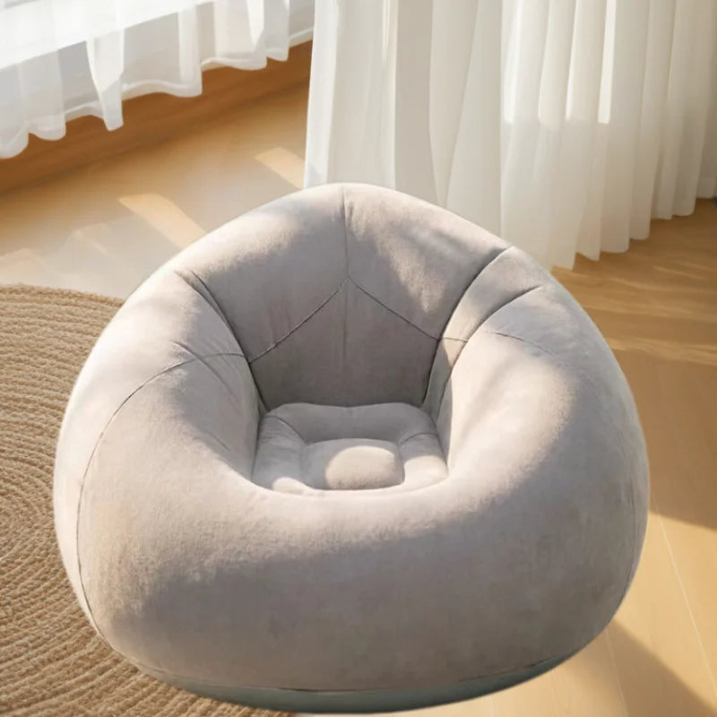 Canape gonflable rond gris en interieur