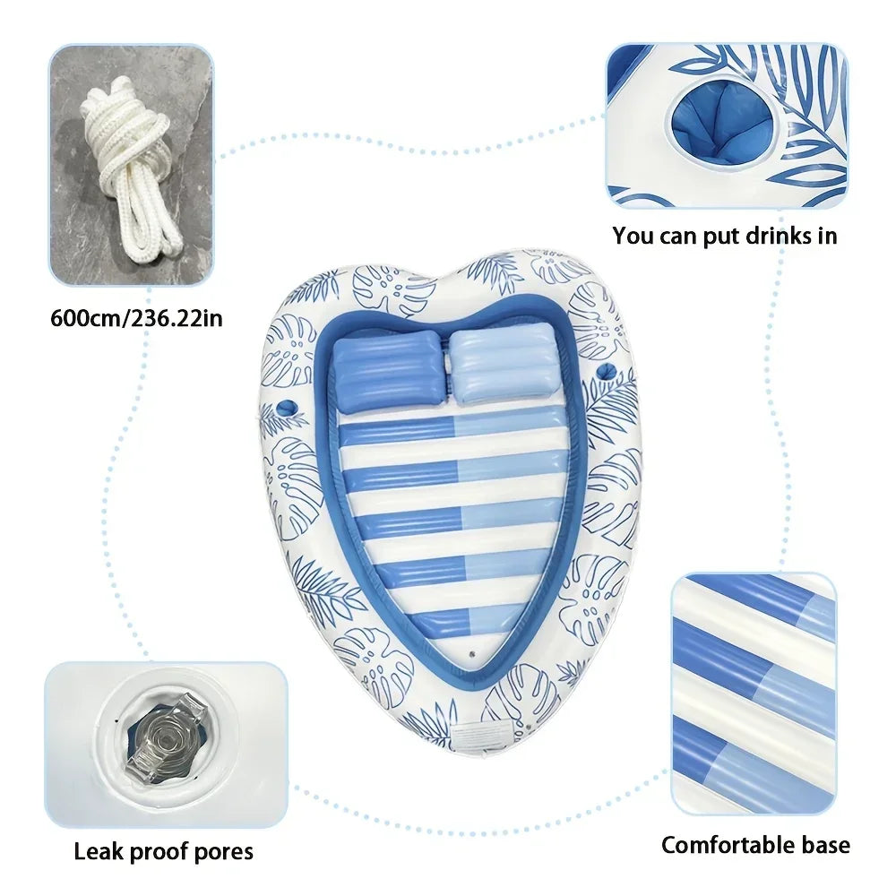 Matelas gonflable en forme de cœur flottant sur l'eau