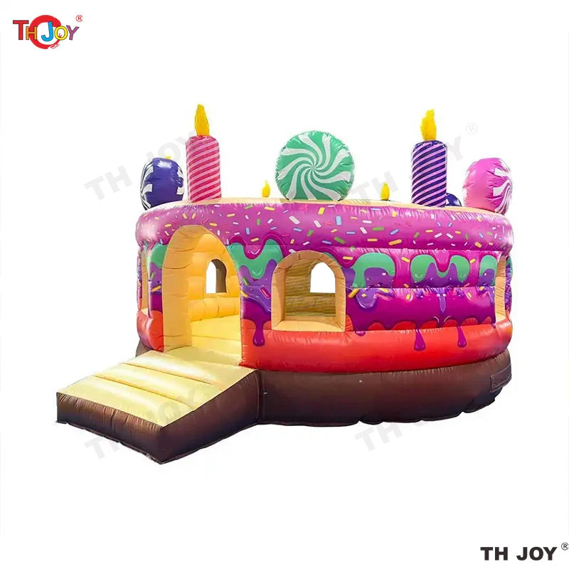 Château gonflable thème gâteau installé pour un anniversaire