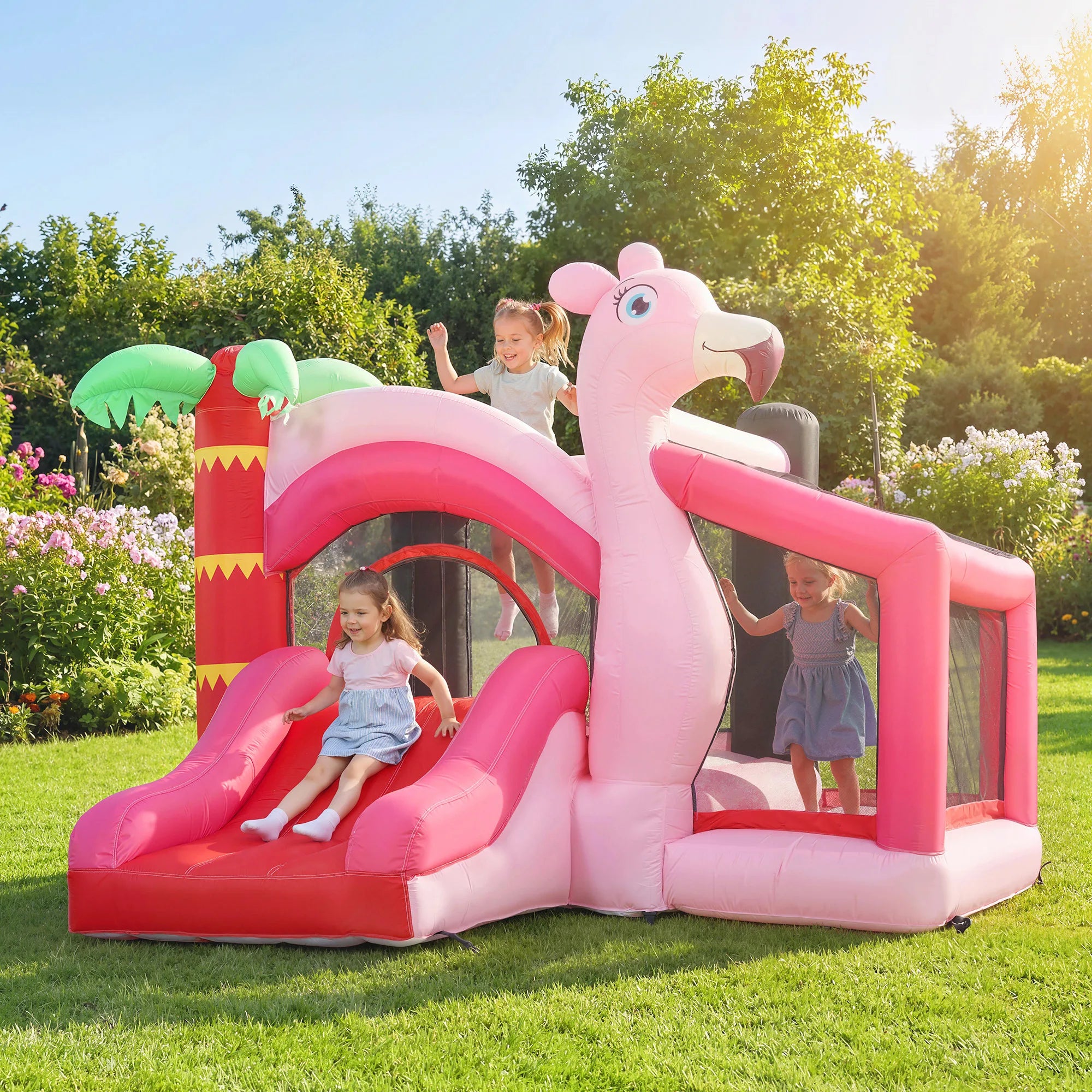 Zone de saut et toboggan du château gonflable flamant rose